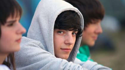 Three teenagers sat together