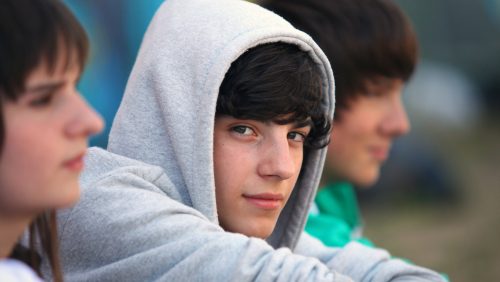 Three teenagers sat together